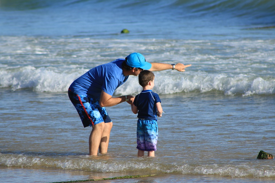 Father and Son on the Beach